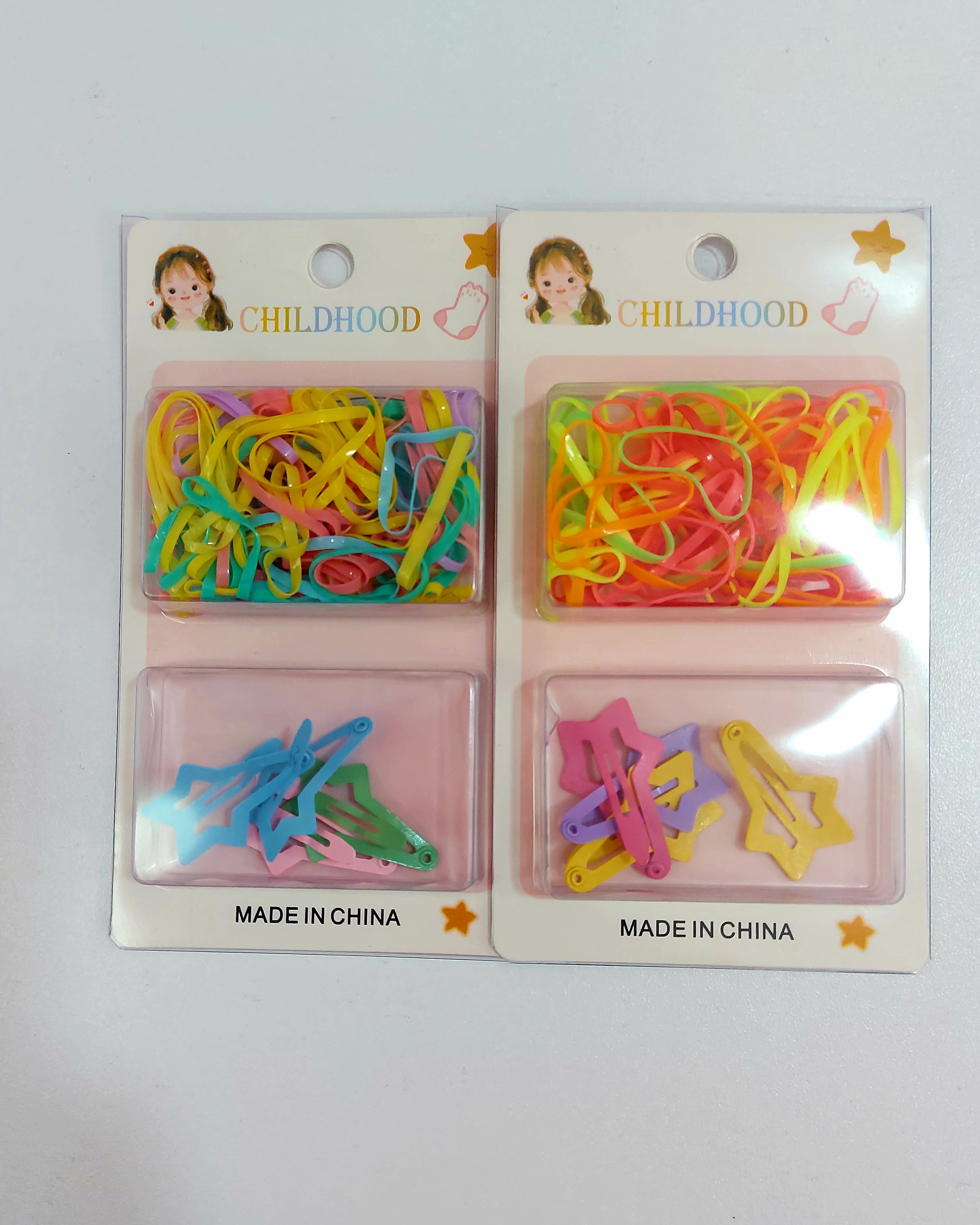 set de ligas y clips tonos surtidos